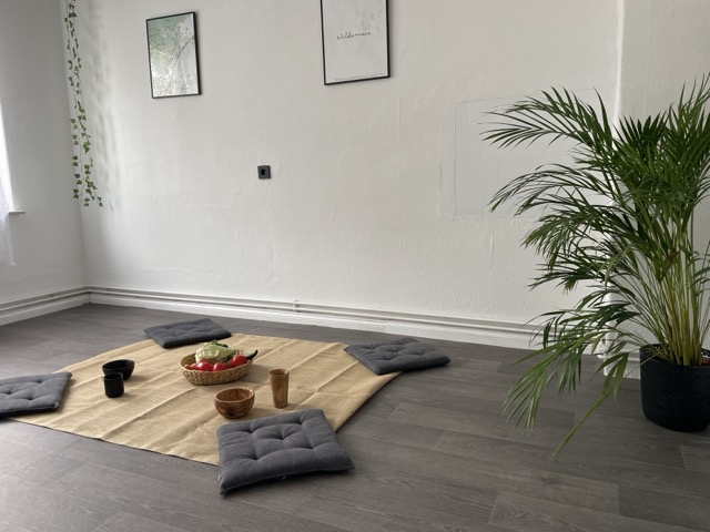 Minimalist kitchen with dining area on the floor