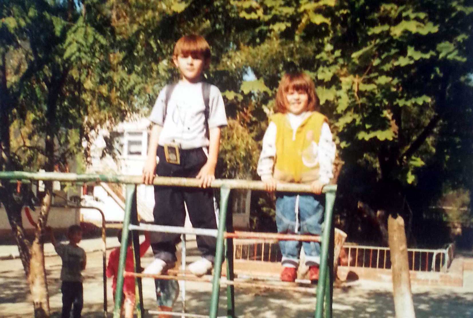 Alexander Fufaev with his Walkman and his sister in the school playground