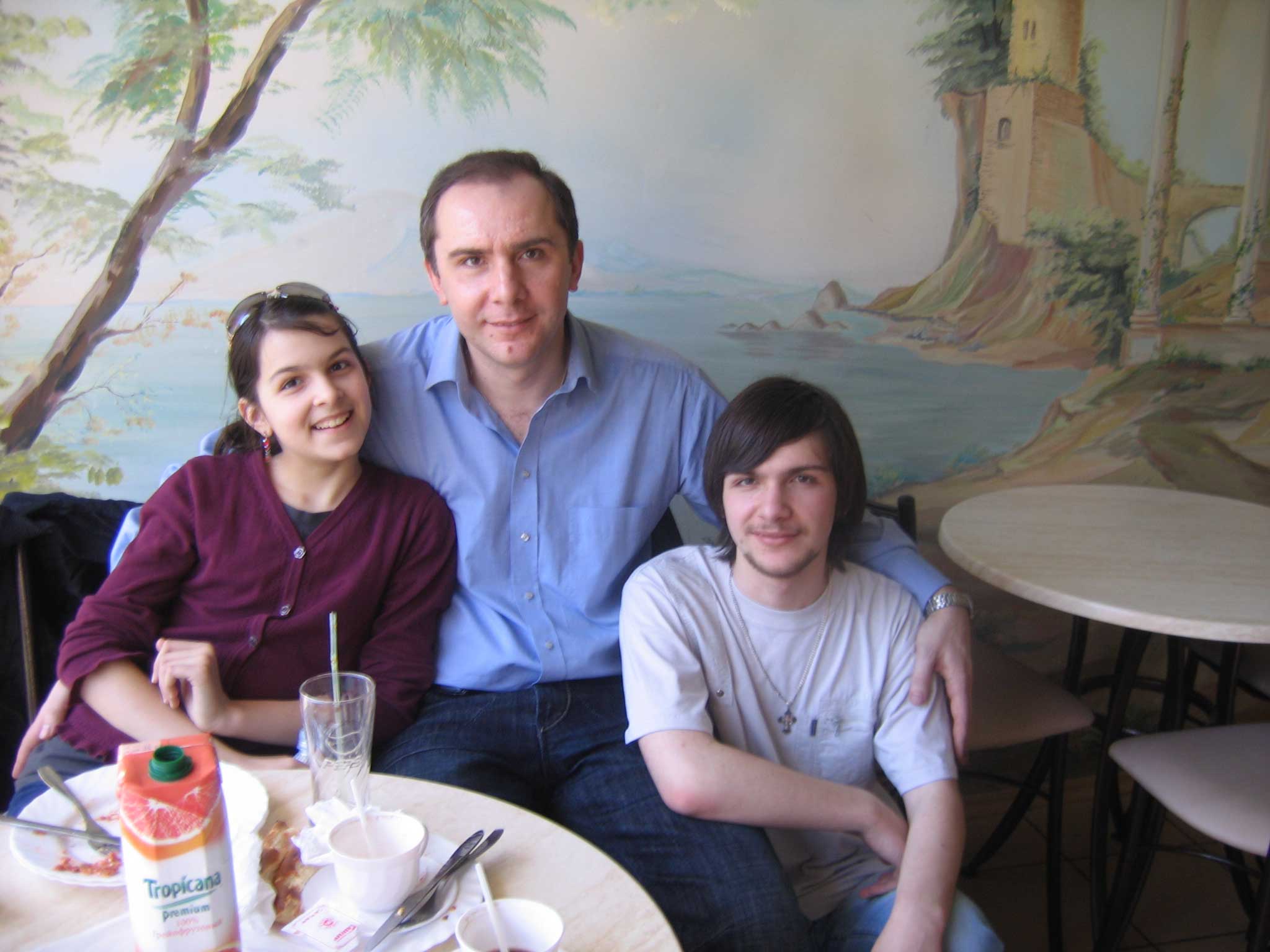 Alexander Fufaev with his father and sister in a café in Rostov-on-Don.