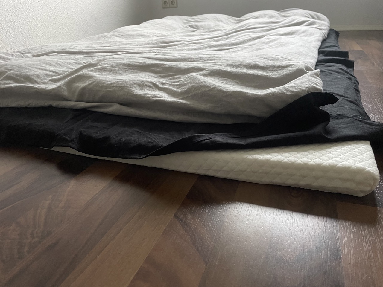 Sleeping on the floor on a thin mattress